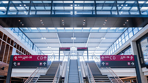 Access to the gates Once they’ve passed security, passengers reach their Terminal 1 departure gate via the marketplace.